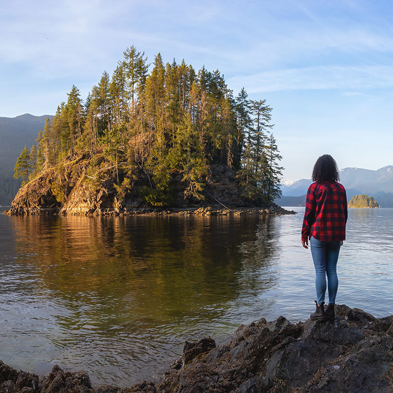 woman looking at ocean